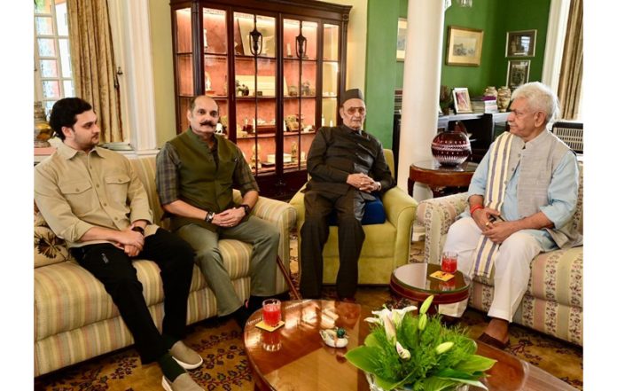 LG Manoj Sinha during his meeting with Dr Karan Singh in Srinagar on Monday.