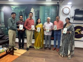 JU Vice-Chancellor and others releasing music book.