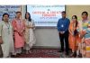 Mukesh Thakur, Principal of Hermann Gmeiner School posing along with others during a workshop in Jammu on Wednesday.