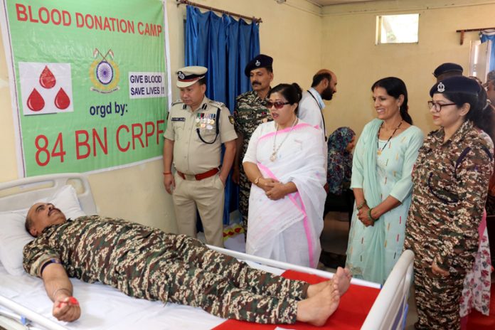 A CRPF official donates blood during Raising Day celebration of 84 Battalion CRPF in Ramban on Saturday.
