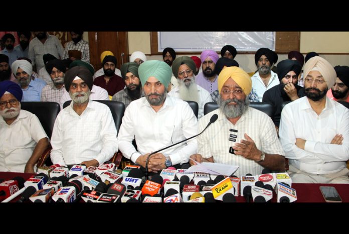 Chairman All J&K Sikh Coordination Committee Ajit Singh addressing a press conference in Jammu. —Excelsior/Rakesh