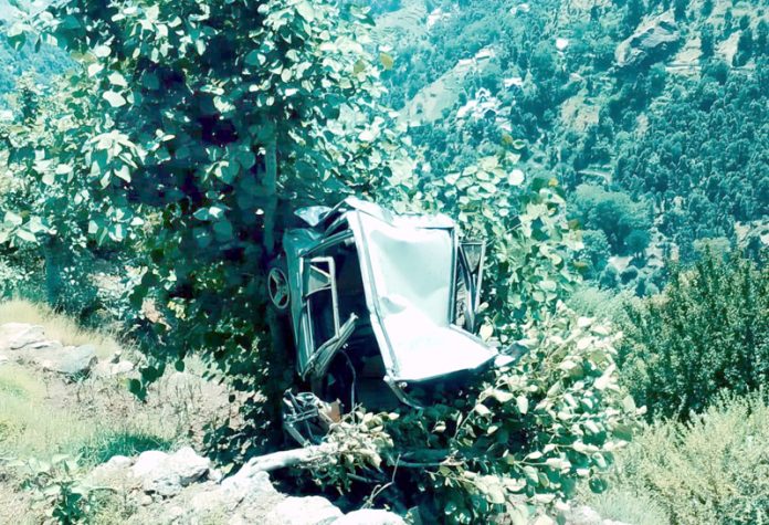 The ill-fated vehicle that met with an accident in Dessa Village of Doda district on Tuesday. — Excelsior/ Rafi Choudhary