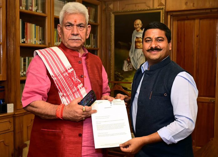 Gaurav Gupta submitting suggestions to LG Manoj Sinha in Srinagar on Wednesday.