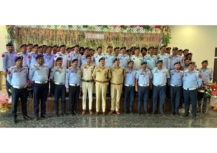 DIG Traffic, Jammu Dr. Mohd Haseeb Mughal posing with other officers during a meeting on Wednesday.