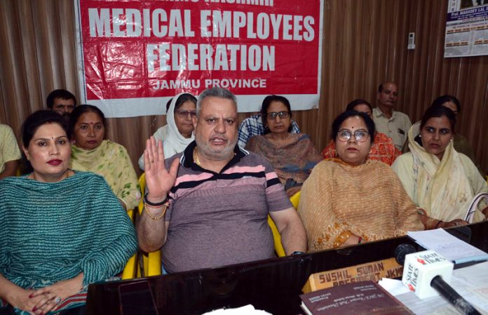 Sushil Sudan and Neelam Kumari, heads of JKMEF and JKFMPHWA addressing a joint press conference in Jammu. -Excelsior/Rakesh