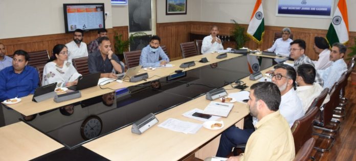 Chief Secretary Atal Dulloo chairing a meeting.