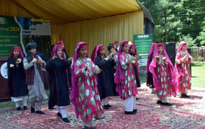 Girls performing cultural item during a programme at Chitternar Bandipora on Saturday.