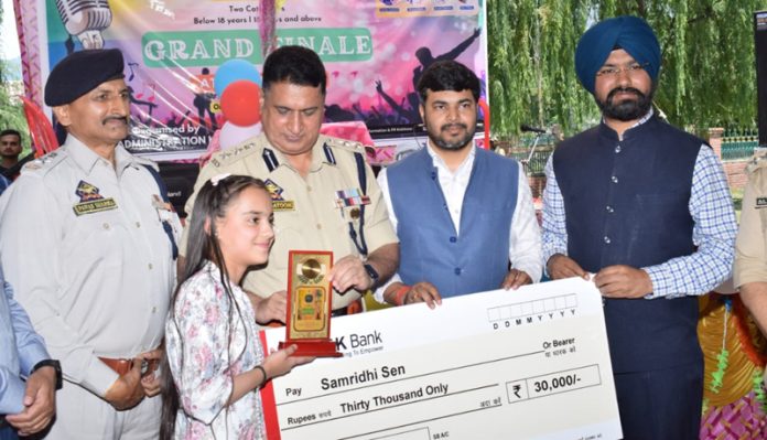 Civil and Police Administration officers awarding a winner during the finale of the Kishtwar Idol Season 2 on Monday.
