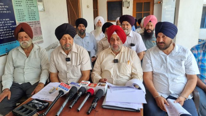 Punjabi Chetna Manch leaders addressing press conference at Jammu.