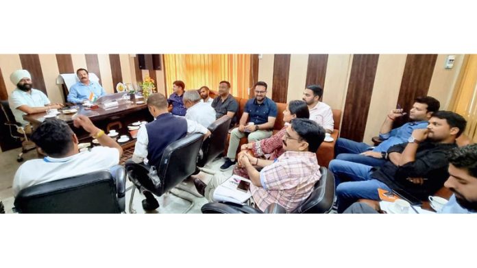 DDC Udhampur Lal Chand chairing a meeting.