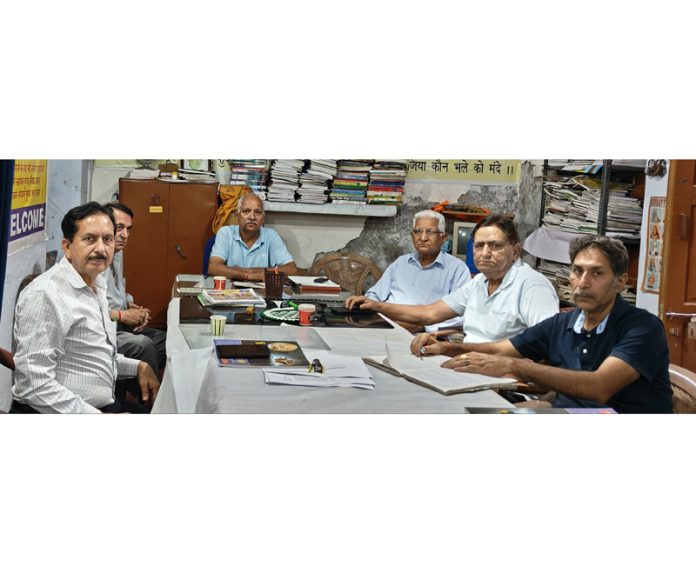 Members of Prabandhak Committee Vishwakarma Mandir, New Plots during a meeting on Tuesday.