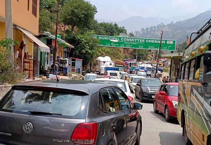 Huge traffic jam at Chenani market on National Highway road in Udhampur district on Sunday.