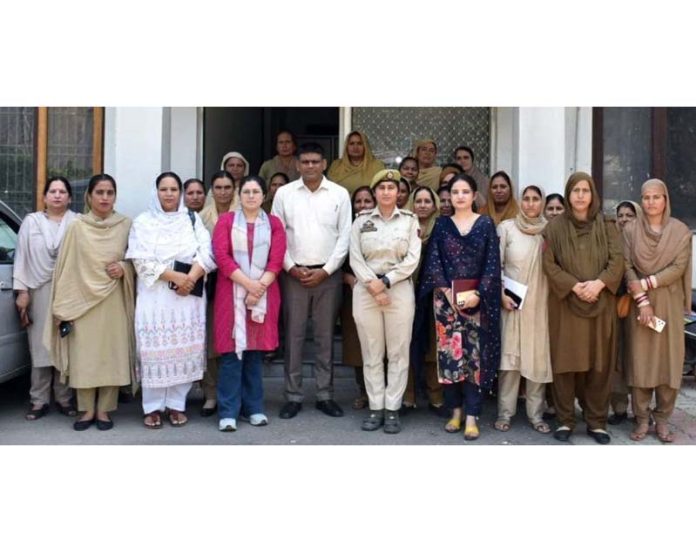 Police officials with women at DPL Ramban.