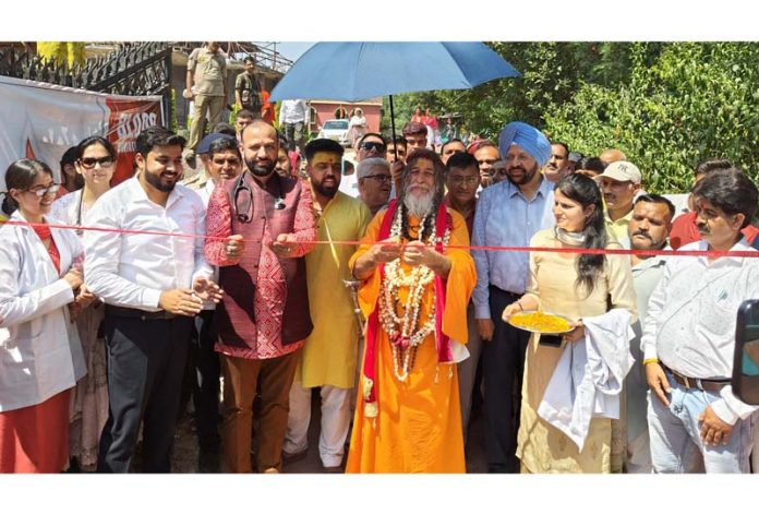 Dr Sushil Sharma and Swami Vishwatamanand inaugurating medical camp at Rajouri on Sunday.