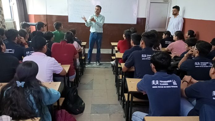 A Professor delivering lecture to the students during an interactive session organised at IIT Jammu on Saturday.