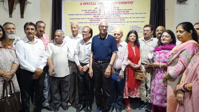 Padamshri Jatinder Udhampuri along with others during a function in Jammu on Monday.