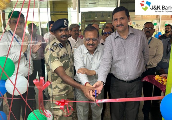 J&K Bank General Manager and Divisional Head Jammu inaugurating ATM on Friday.