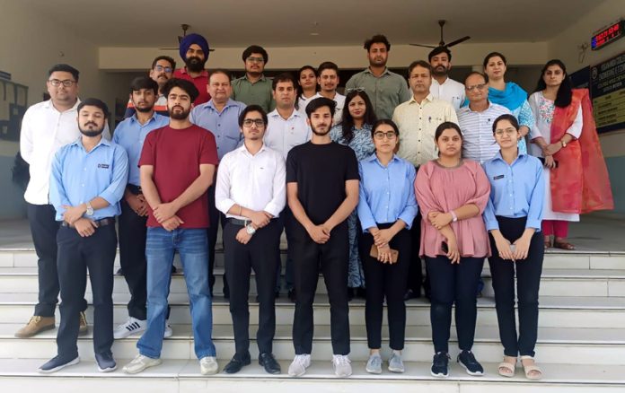 Students selected in placement drive posing with Vidhi S. Singh Jamwal, Chairman, JGEI in Jammu on Tuesday.