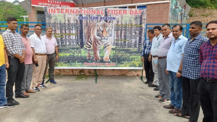 Dignitaries celebrating International Tiger Day at Jambu Zoo on Monday.