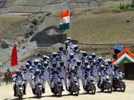 Troops performing motorbike stunts to honour the valour and sacrifices of the Kargil war heroes on the eve of 25th anniversary of Kargil war on Thursday. (UNI)