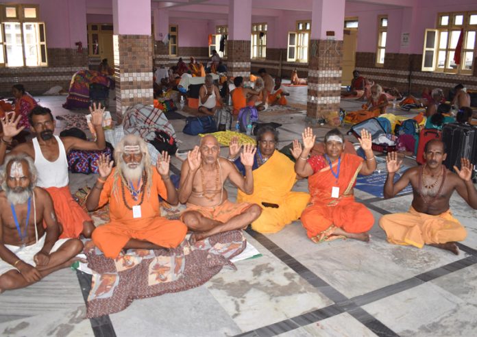 Shri Amarnath Ji shrine bound Sadhus at Ram Mandir, Purani Mandi waiting for their registration on Thursday. -Excelsior/Rakesh