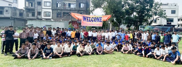 Players of different disciplines posing along with dignitaries during opening ceremony of Inter School Zone level competition at Poonch on Tuesday.