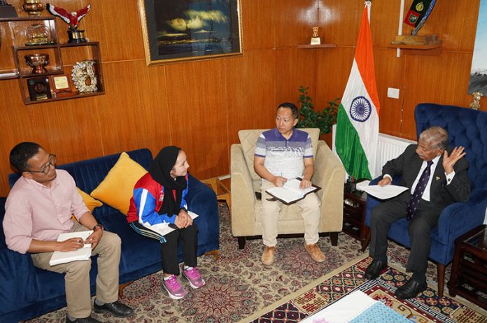 Taekwondo player Shahnaz Parveen meeting with LG Ladakh Brig (Dr) B D Mishra (Retd.).