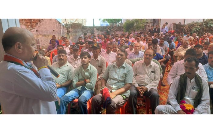 Ex-DyCM Tara Chand addressing party meeting at Panjtoot in Chhamb Constituency of district Jammu.