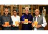 Lt Governor Manoj Sinha releasing book titled Umeed Abhi Baqi Hai on Monday.