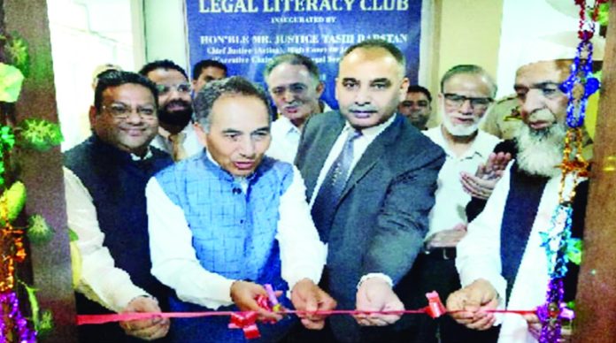 Justice Tashi Rabstan inaugurating LLC at Srinagar on Saturday.