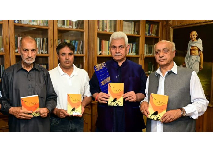 Lt Governor Manoj Sinha releasing book titled Umeed Abhi Baqi Hai on Monday.