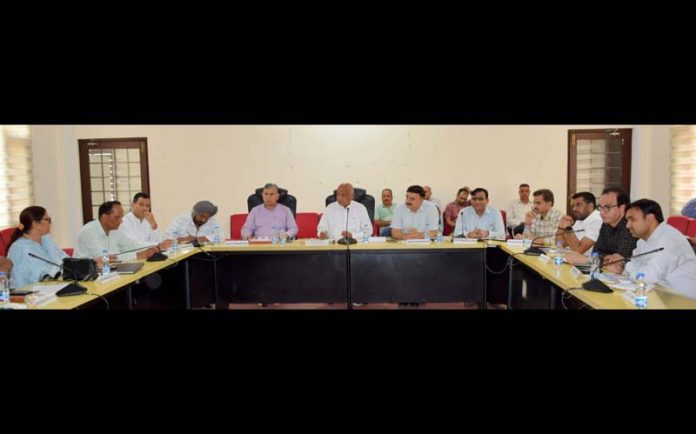 DDC Chairman Jammu Bharat Bhushan chairing a meeting on Monday.