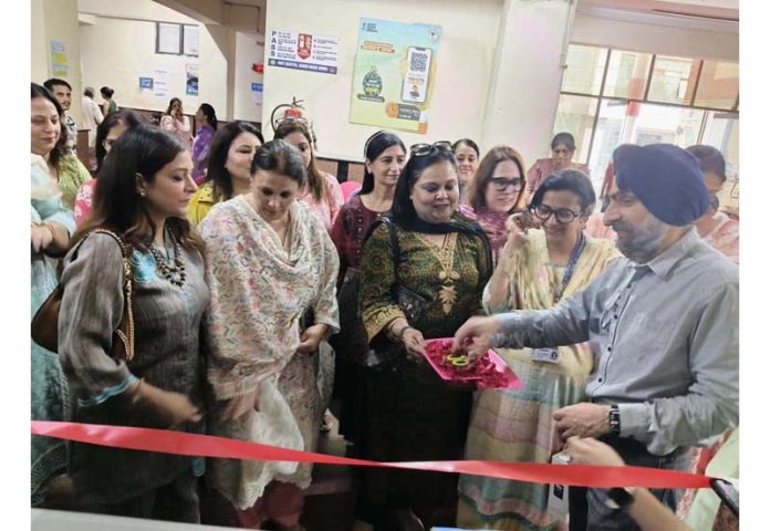 Head of 'Jachcha Bachcha' project, Sapna Sethi and others during inauguration of a water cooler with purifier at Government Hospital, Gandhi Nagar, Jammu.
