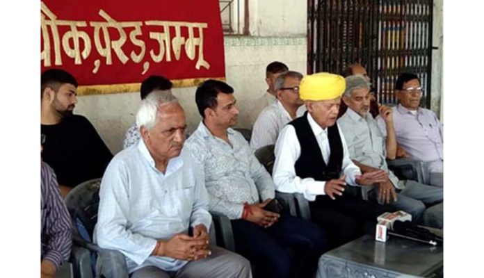 President of Dogra Brahman Pratinidhi Sabha talking to media persons after a meeting of the Sabha members on Saturday.