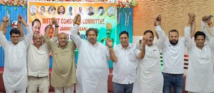 Senior Cong leaders Raman Bhalla, Ravinder Sharma and others during public meeting in Jammu West on Monday.