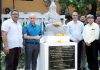 Principal, GMC Jammu Dr Ashutosh Gupta and others posing alongside statue of Maharishi Sushruta in College premises.