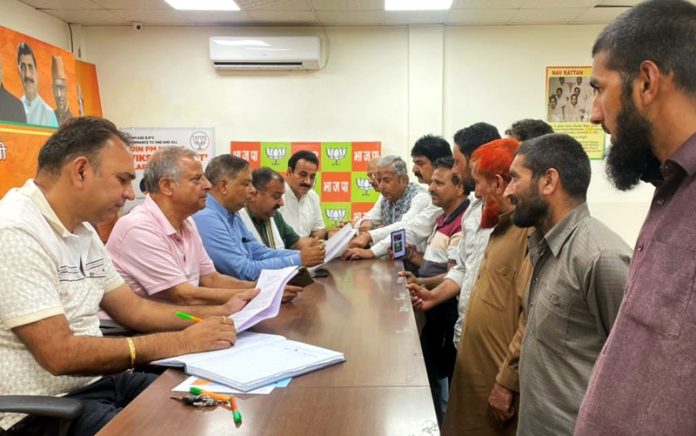 BJP leaders during a grievances redressal camp in Jammu on Wednesday.