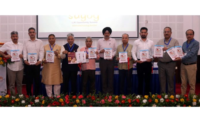 Dignitaries releasing annual souvenir of LEAD during a Summit at Jammu on Tuesday.