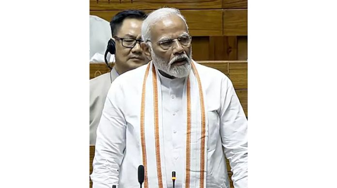 Prime Minister Narendra Modi speaking during debate in Lok Sabha, in New Delhi on Monday.