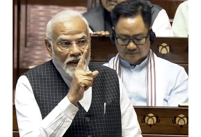 Prime Minister Narendra Modi speaking in the Rajya Sabha on Wednesday. (UNI)