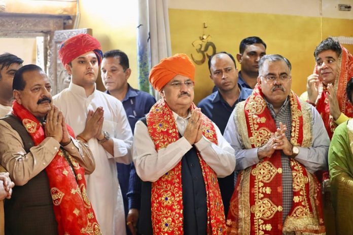 BJP president and Union Minister JP Nadda and Dr Jitendra Singh paying obeisance at historical Raghunath Temple at Jammu on Sunday. Another pic on page 4. - Excelsior/Rakesh