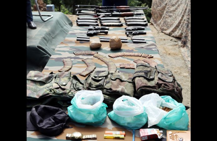 Arms and ammunition recovered from three killed militants during an encounter in Keran area of Kupwara district. -Excelsior/Aabid Nabi
