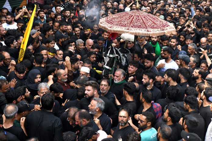 Shia mourners take part in a religious procession on the 10th day of Ashura in the Islamic month of Muharram in Srinagar. — Excelsior/Shakeel