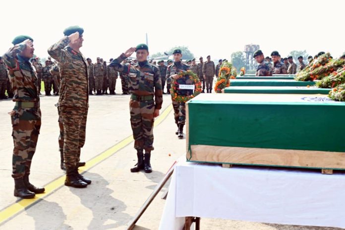 Army officers pay tribute to fallen soldiers at Pathankot on Tuesday.