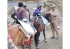 JKP cops checking the yatris and service providers near holy cave on Saturday.