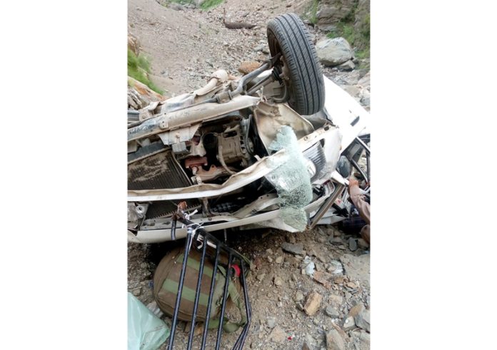 Remains of a car which met with an accident in Kishtwar on Tuesday. - Excelsior/Tilak Raj