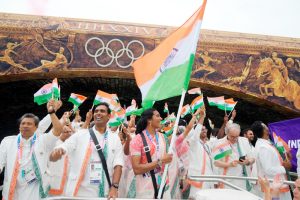 Indian contingents holding national flag during opening ceremony of Paris Olympics.