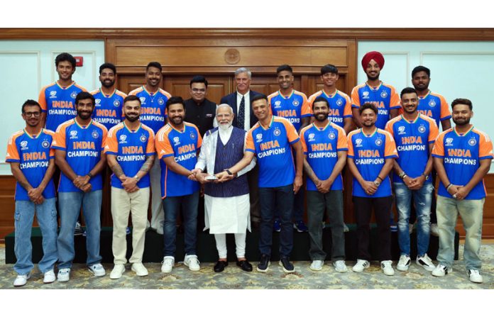 Prime Minister Narendra Modi poses for a group photograph with the 2024 T20 World Cup-winning Indian cricket team in New Delhi on Thursday.(UNI)