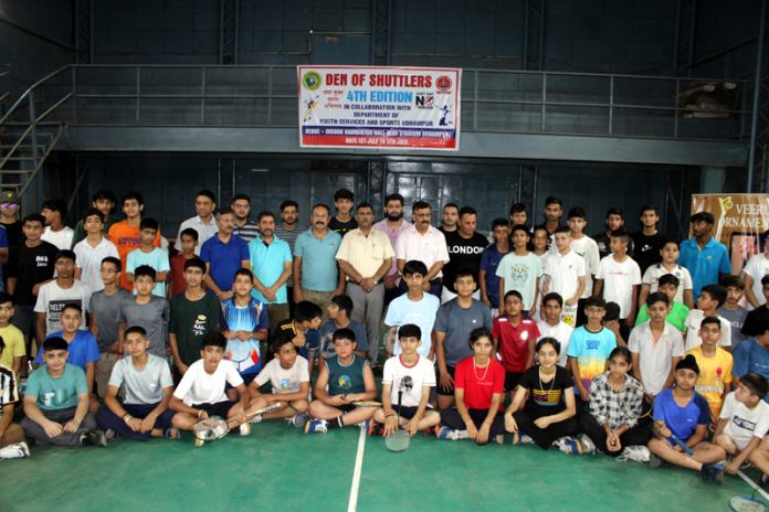 ADC Udhampur, Joginder Singh Jasrotia posing along with budding badminton players in Udhampur.