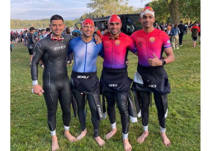 Aman Gupta, Archit Puri, Sawan Nagpal and Sukaran Raj Sharma posing during IRONMAN Vitoria-Gasteiz competition in Spain.